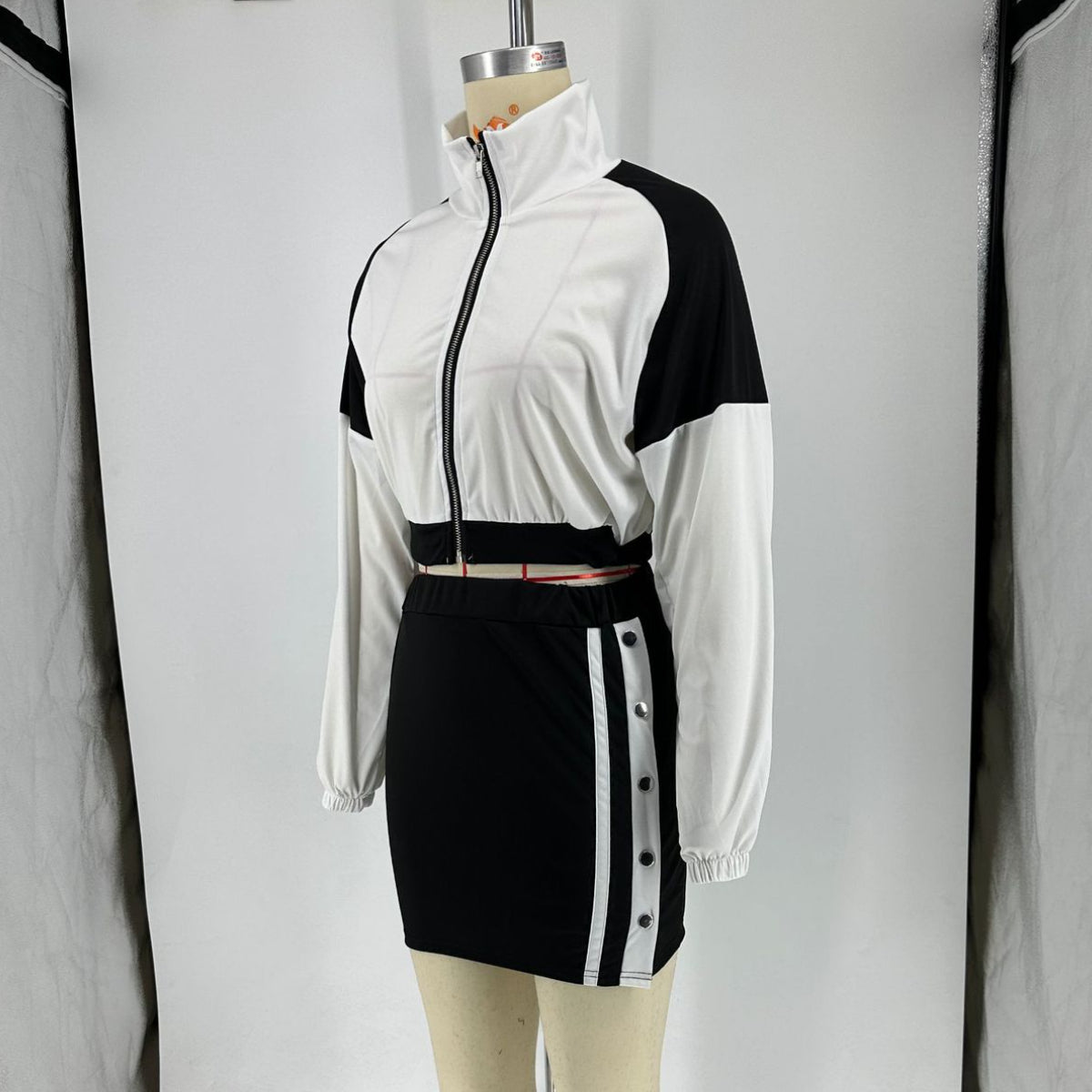 Split color-block long sleeve short skirt set stretch two-piece