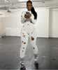 PERFORATED LONG SLEEVE BACK STRAP WOOLEN LONG JUMPSUIT