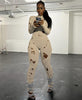 PERFORATED LONG SLEEVE BACK STRAP WOOLEN LONG JUMPSUIT